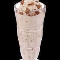 Kit Kat® · Our hand-dipped milkshake is blended with plenty of crunchy, chocolatey KIT KAT® pieces and ...