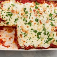 Eggplant Parmesan · Eggplant topped with marinara sauce and melted mozzarella cheese.