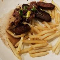 Steak Frites · flat iron steak, shoestring potatoes, sidecar of mushroom Brandy sauce