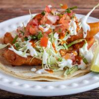 Fish Tacos · Cabbage, Chipotle Sauce and Pico de Gallo.