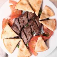 Gyro & Feta Salad · Sliced Greek gyro and feta cheese, garnished with red onions, tomatoes and kalamata olives o...