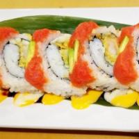 Tiger Roll · Shrimp tempura inside with spicy tuna and avocado on top with spicy, creamy and sweet sauce.