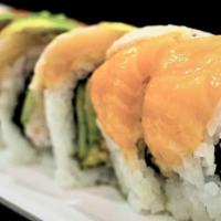 Rainbow Roll (8) · Crab, avocado and cucumber , topped with fresh fish.