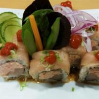 Albacore Delight · Snow crab and albacore inside with albacore on top with spicy and garlic ponzu.