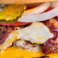 Badmash Burger · Double Beaf Patty, Grilled Beacon, Egg, Lettuce, Onions, Tomatoes, Pickles, Swiss Cheese, Ch...
