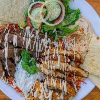 Combo Platter · Gyro Meat, Chicken, Salad, Rice, Tzatziki, Hummus, Pita Bread