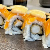 Ritz Roll · Shrimp tempura. Top: Smoked salmon, spicy mayo, and thin lemon slices