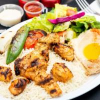 Chicken Taouk Plate · Favorite. Two skewers of charbroiled chicken breast served with garlic sauce.
