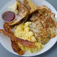 French Toast Combo · Two pieces of our French toast with cinnamon, powdered sugar, butter, and sugar. Comes with ...
