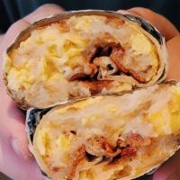 Basic Breakfast Burrito · Your choice of bacon, sausage, chorizo, turkey, or ham with eggs, hash browns, and cheese in...