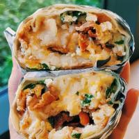 Light Burrito · Bacon, spinach, tomato, with egg whites, hash browns, and cheese included inside.

NOTE: Onl...