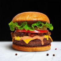 Classic Burglar Burger · American beef patty topped with buttered lettuce, tomato, onion, and pickles. Served on a gr...