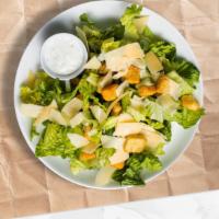 Classic Caesar Salad · (Vegetarian) Romaine lettuce, house croutons, and parmesan cheese tossed with Caesar dressing.