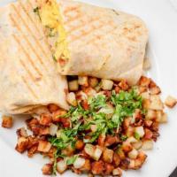 Breakfast Burrito · Scrambled eggs, pico de gallo, cheddar, whole wheat tortilla, served with grilled potatoes.