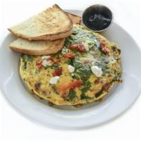 Burgundy Omelette · Three egg open-face omelette, spinach, chevre goat cheese, sun-dried tomatoes, mushrooms, fr...