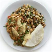 Migas · Scrambled eggs, jalapeños, soy chorizo sausage, chipotle, red bell peppers, corn tortilla ch...