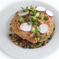 Vegan Organic Tofu Tostada · Crispy tortilla, tofu, black beans, red radishes, red bell peppers, avocado, pico de gallo, ...