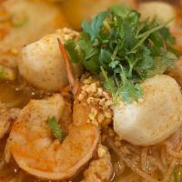 Tom Yum Noodle · Rice noodles cooked with shrimp, ground chicken fish ball fish cake bean sprouts scallion to...