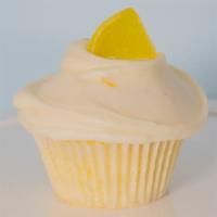 Lemon / Cream Cheese · Lemon cake, with a lemon zest cream cheese frosting topped with a candy lemon gummy.