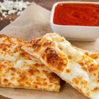 Garlic Cheese Bread Sticks · Made with our always-fresh pizza dough, mozzarella cheese, garlic, and parmesan cheese. Serv...