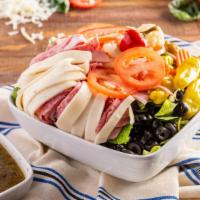 Antipasto Salad · Made with lettuce, cabbage, tomato, olives, ham, mortadella, salami, provolone, cherry peppe...