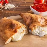 Ricotta & Mozzarella Calzone · Our classic calzone, made with ricotta and mozzarella cheeses inside a pocket of pizza dough.