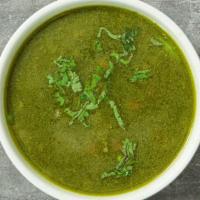 Aguadito  #1 Chicken And Cilantro Soup · Chicken cilantro soup. A cilantro based chicken soup slow simmered in a broth with carrots a...