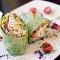 Greek Wrap · Grilled chicken, kalamata olives, romaine lettuce, pepperoncini, cucumbers in a spinach wrap...