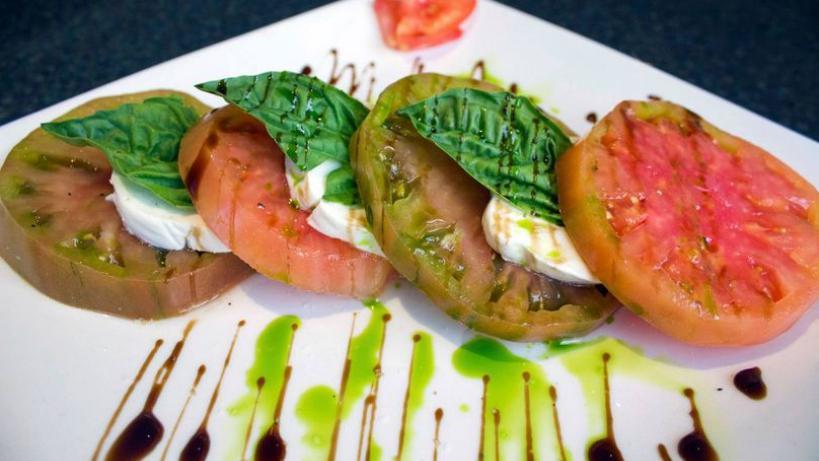 Caprese Salad · Small. Fresh mozzarella, vine ripened tomatoes, and basil leaves with garlic infused olive oil.