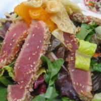 Seared Tuna Salad · Sesame seared tuna, shredded cabbage, carrots, peppers, oranges, and crispy wontons tossed i...