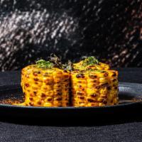 Robata Street Corn
 · Served on the cob with shichimi Citrus Butter