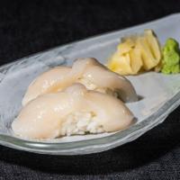 Hotate - Jumbo Scallop · Two slices Scallops served on top of sushi rice