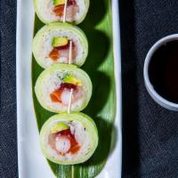 Katsuya Roll · Tuna, yellowtail, salmon, scallop, crab, and avocado wrapped in rice, soy paper and cucumber