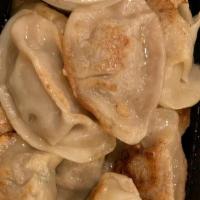 Pork And Chive Pot Stickers (12) · 