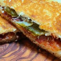 Jalapeno Popper Grilled Cheese · Pickled jalapenos, cream cheese and bacon on sourdough.