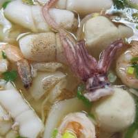 Seafood Noodle Soup · Hot. Rice noodles with shrimp, calamari, fish, green mussel, imitation crab, fish balls and ...