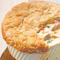 Heartland Chicken Pot Pie · Loaded with tender chunks of chicken with seasonings and vegetables and topped with our famo...