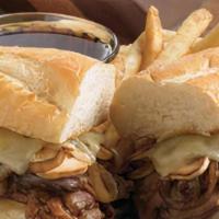 French Dip Supreme · Sliced USDA Choice roast beef with caramelized onions, sautéed mushrooms and melted swiss ch...