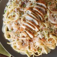 Shrimp & Chicken Carbonara · Grilled chicken breast and tender shrimp lightly sauteed in a rich creamy sauceblended with ...