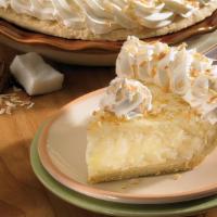 Slice Coconut Cream · Coconut folded into our rich vanilla cream. Topped with fresh whipped cream.
Cal: 650.