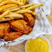 Personal Combos (8 Pieces) · 8 piece wings with fries or veggie sticks, 1 dipping sauce and 22 oz. fountain drink.