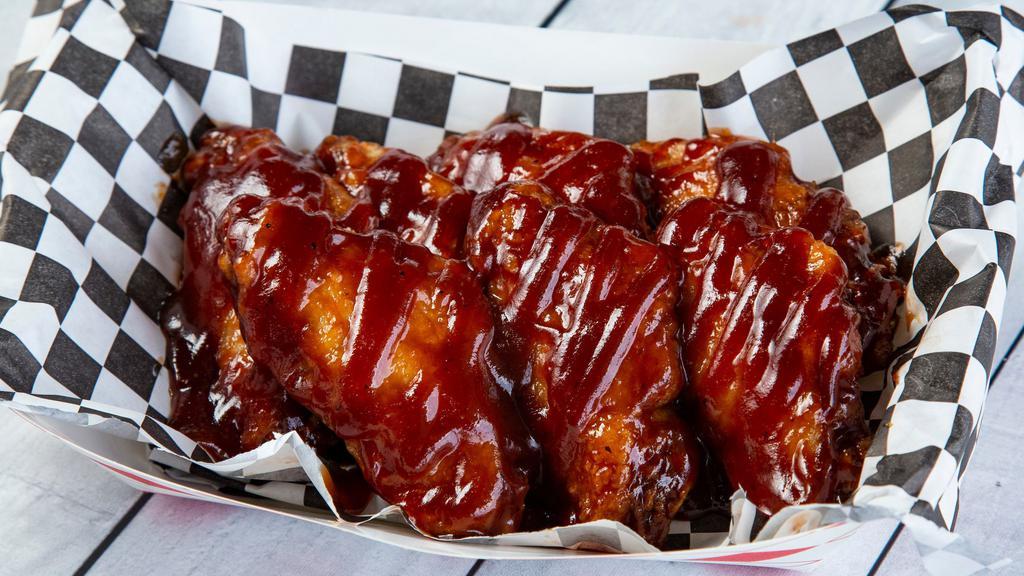 Wings (10 Pieces) · 10 piece wings tossed in choice of sauces.