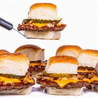 Impossible™ Sliders Combo · 3 griddled impossible patties, with steamed onions, dill pickle, melted American cheese on b...
