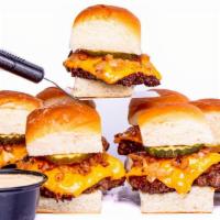 Beef Sliders Combo · 3 griddled beef patties, with steamed onions, dill pickle, melted American cheese on buttere...