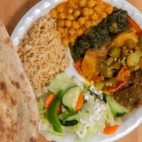 Vegetarian Plate · Vegetables of the day, cooked with spices and herbs.