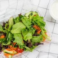 Santa Monica House Salad · Gluten-free and vegetarian. Tossed greens, tomatoes, carrots, cucumbers and choice of dressi...