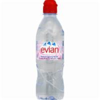 Evian · French flat water. Glass bottle.