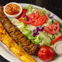 Koobideh Mix · One skewer of ground beef and chicken cooked over open fire.