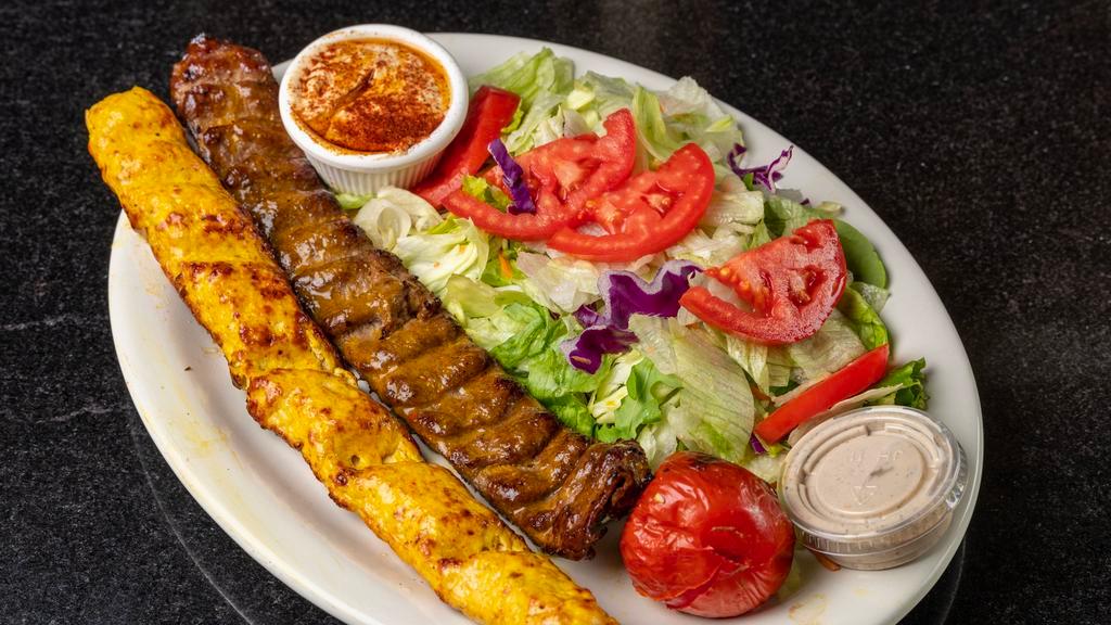 Koobideh Mix · One skewer of ground beef and chicken cooked over open fire.