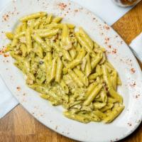 Penne Pesto Pasta · Served with out housemade marinara sauce, bread sticks and side salad